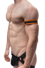 Model wearing a 1.5" orange leather armband with black racing stripe detail.