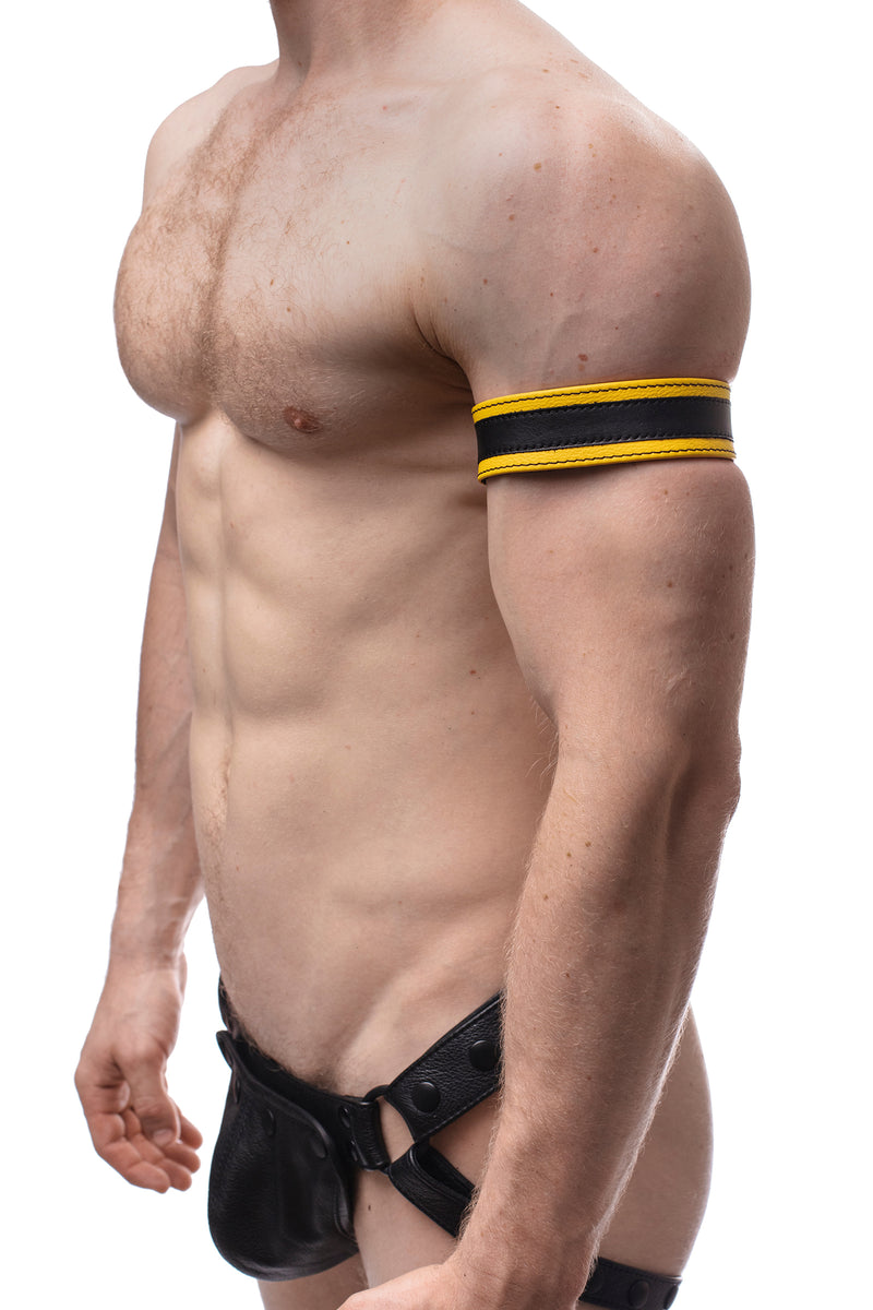 Model wearing a 1.5" yellow leather armband with black racing stripe detail.