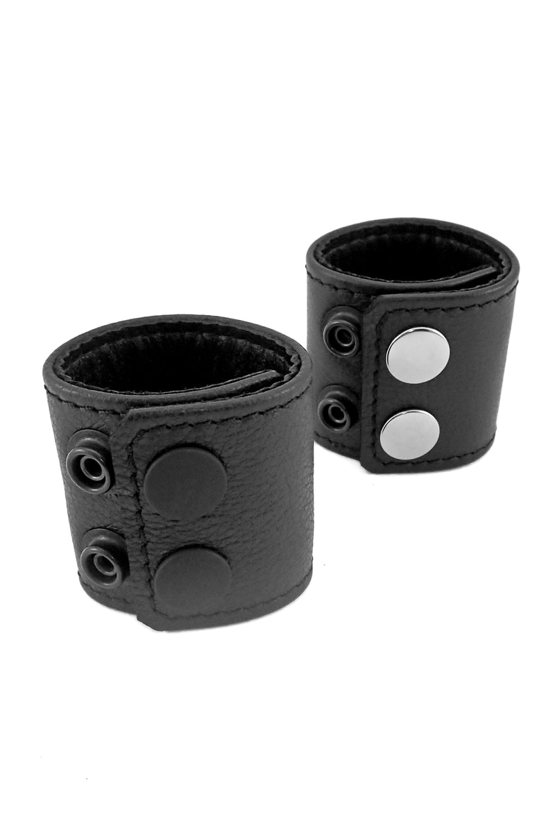 Black leather and stainless steel 2" wide ball stretchers