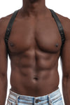 Model wearing black leather braces with black metal hardware as shoulder harness. Front 3.