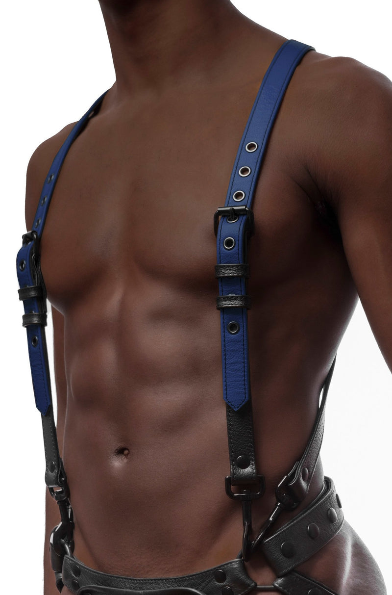 Model wearing blue and black leather braces kit with black metal hardware attached to leather jock. Front view.