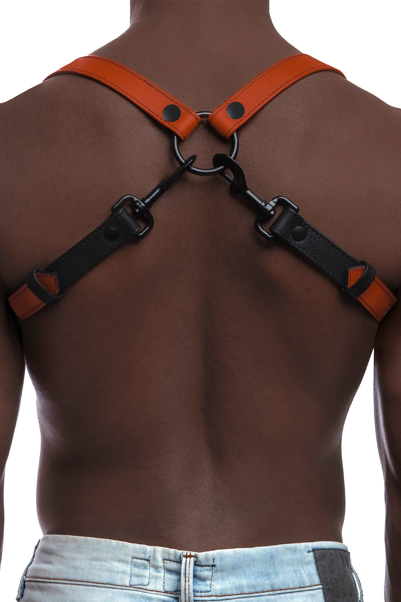 Model wearing orange and black leather braces with black metal hardware. Back view.