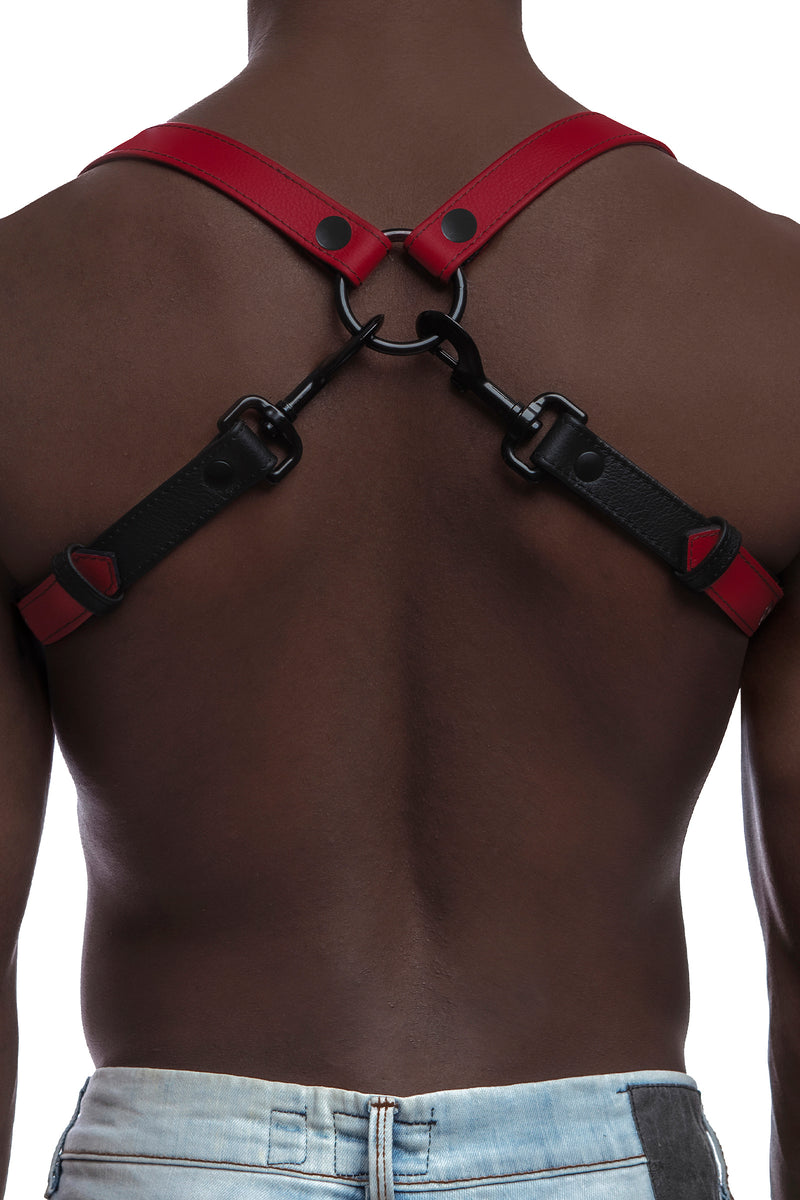 Model wearing red and black leather braces with black metal hardware. Back view.