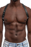 Model wearing black leather braces with stainless steel hardware as shoulder harness. Front 3.