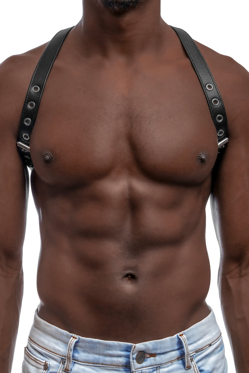 Model wearing black leather braces with stainless steel hardware as shoulder harness. Front 3.