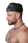 Model wearing black flight cap with army green stripes