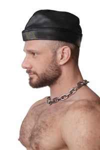 Model wearing black flight cap with army green stripes