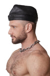 Model wearing black flight cap