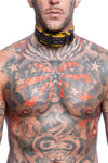 Model wearing a 1.5" black and yellow leather pup collar