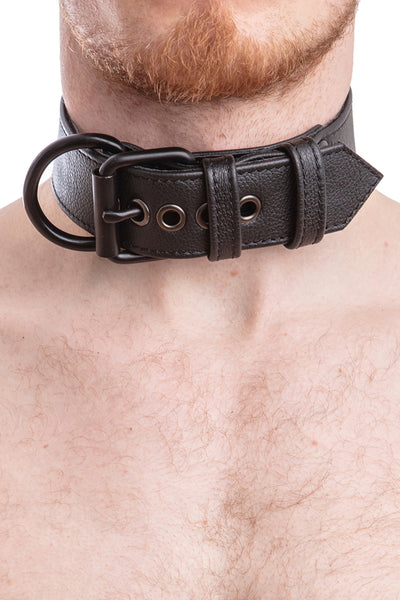 Model wearing black leather pup collar with matt black buckle and D-ring