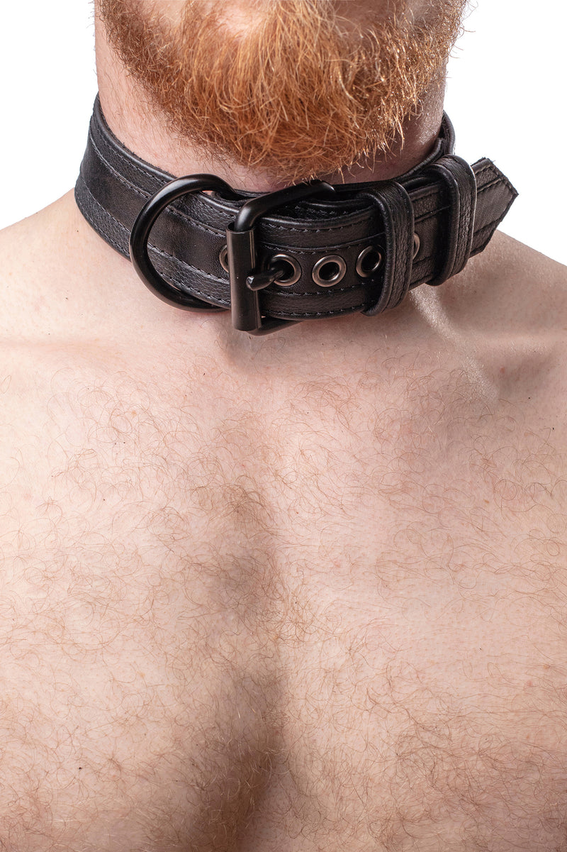 Model wearing black racer stripe leather pup collar with matt black buckle and D-ring