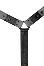 Grey leather bulldog harness connector with black hardware. Lining.