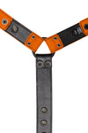 Orange leather bulldog harness connector with black hardware. Lining.