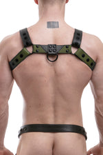 Model wearing an army green leather chevron bulldog harness