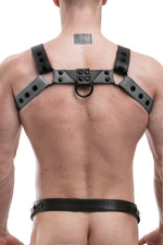 Model wearing a grey leather chevron bulldog harness
