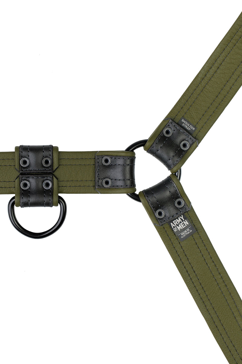 Black and army green leather combat bulldog harness with matt black metal hardware. Back view.