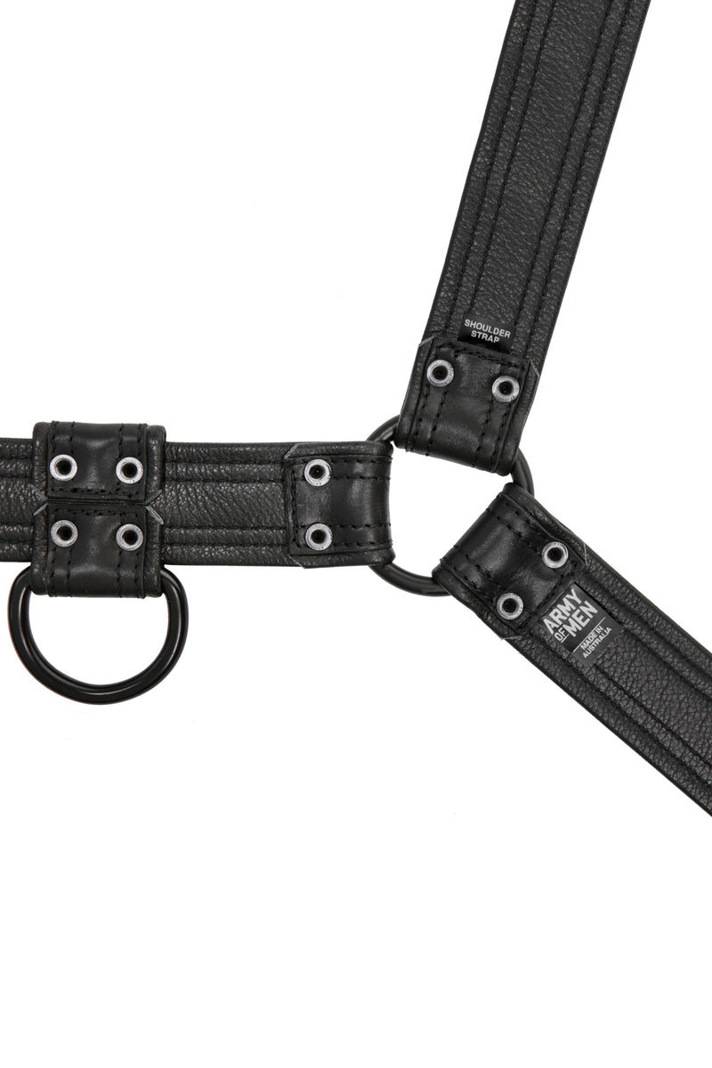 Black leather combat bulldog harness with matt black metal hardware. Back View.