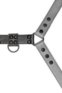 Grey leather bulldog harness with black hardware. Close up.