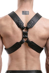 Model wearing a black leather commander harness with matt black hardware