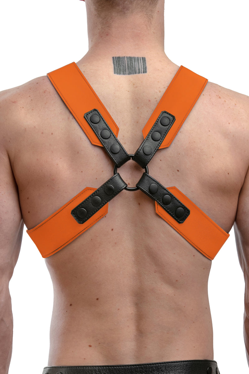 Model wearing an orange leather sergeant harness