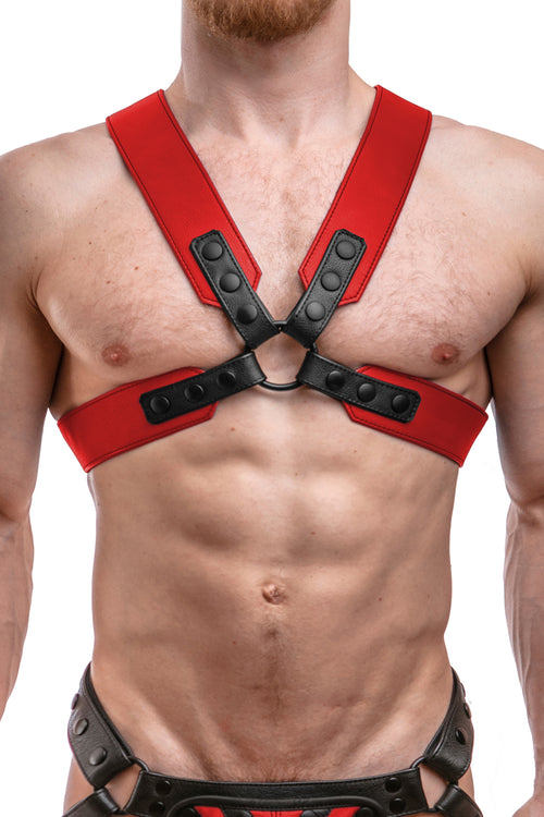 Model wearing a red leather sergeant harness