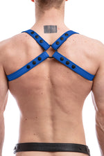 Model wearing blue leather shoulder harness back