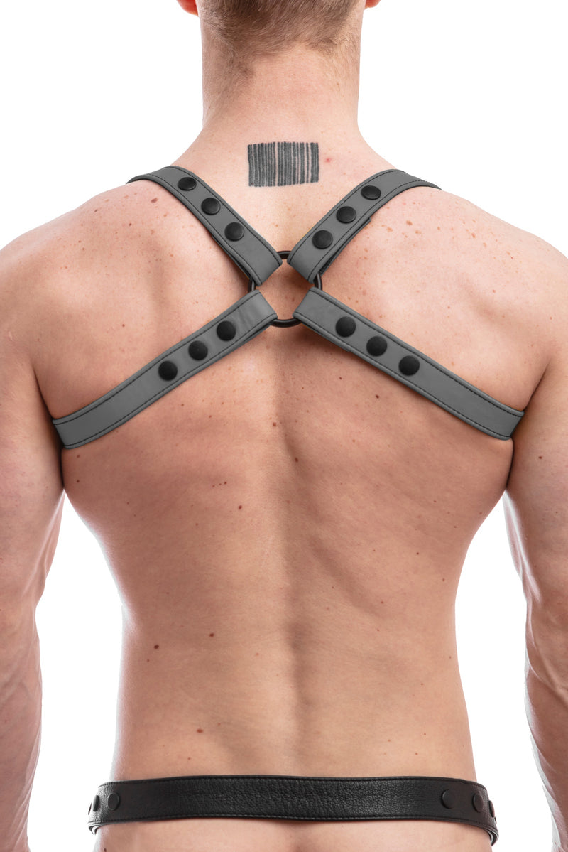 Model wearing grey leather shoulder harness back