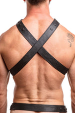 Model wearing black leather universal x harness