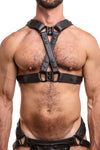 Model wearing black leather universal x harness  with black metal hardware