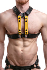 Model wearing yellow leather universal x harness