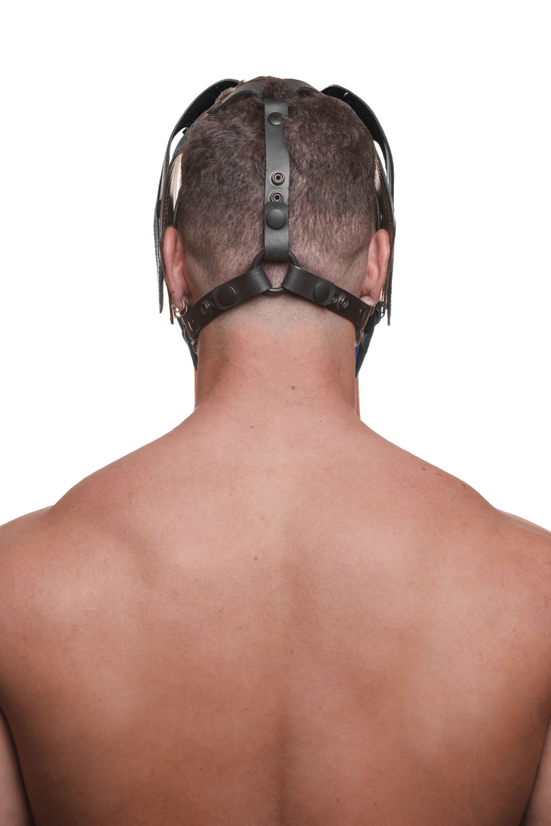 Model wearing a black leather pup mask and head harness back view