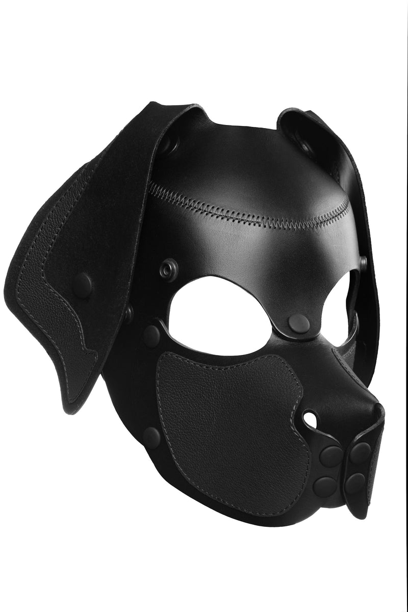Product photo of a black leather pup mask with floppy ears three quarter view