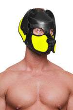 Model wearing a black and fluro yellow leather pup mask and head harness three quarter view