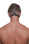 Model wearing a black leather pup mask and head harness with stainless steel hardware back view