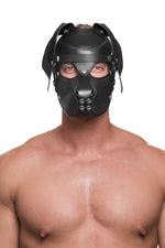 Model wearing a black leather pup mask and head harness with stainless steel hardware front view