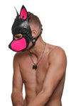 Model wearing a black and fluro pink leather pup mask and head harness side view