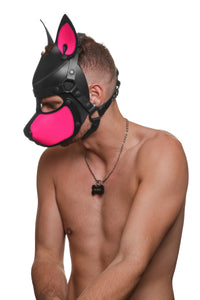 Model wearing a black and fluro pink leather pup mask and head harness side view
