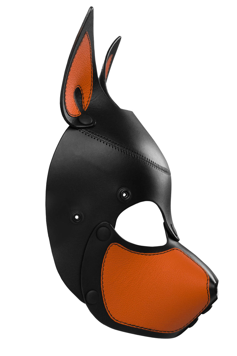 Product photo of a black and orange leather pup mask with pointy ears side view