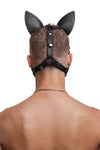 Model wearing a black leather pup mask and head harness with stainless steel hardware back view