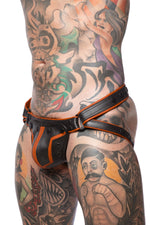 Model wearing a black and orange combat leather jockstrap. Side view.