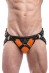 Black leather jockstrap with orange and black leather harness codpiece