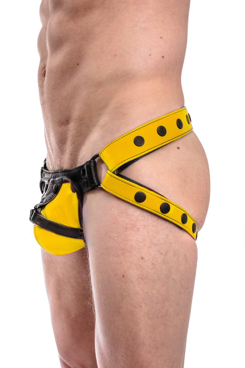 Yellow leather jockstrap with yellow and black leather harness codpiece