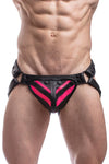 Model wearing a black leather jockstrap with a fluro pink striped codpiece