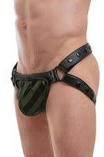 Model wearing a black leather jockstrap with army green and black leather tiger striped codpiece