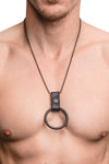 Model wearing cockring chain