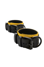Yellow and black leather ankle restraints