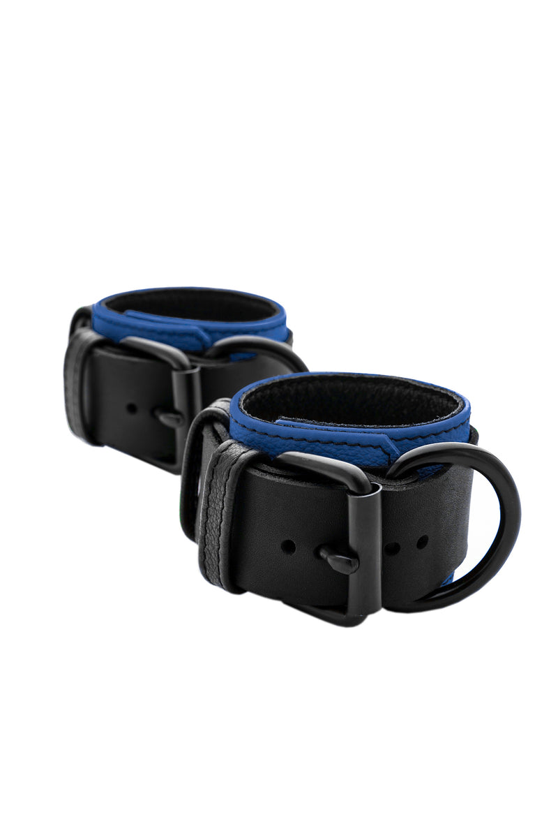 Blue and black leather wrist restraints