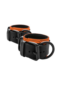 Orange and black leather wrist restraints