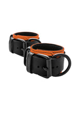 Orange and black leather wrist restraints