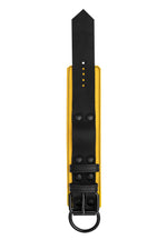 Yellow and black leather wrist restraint